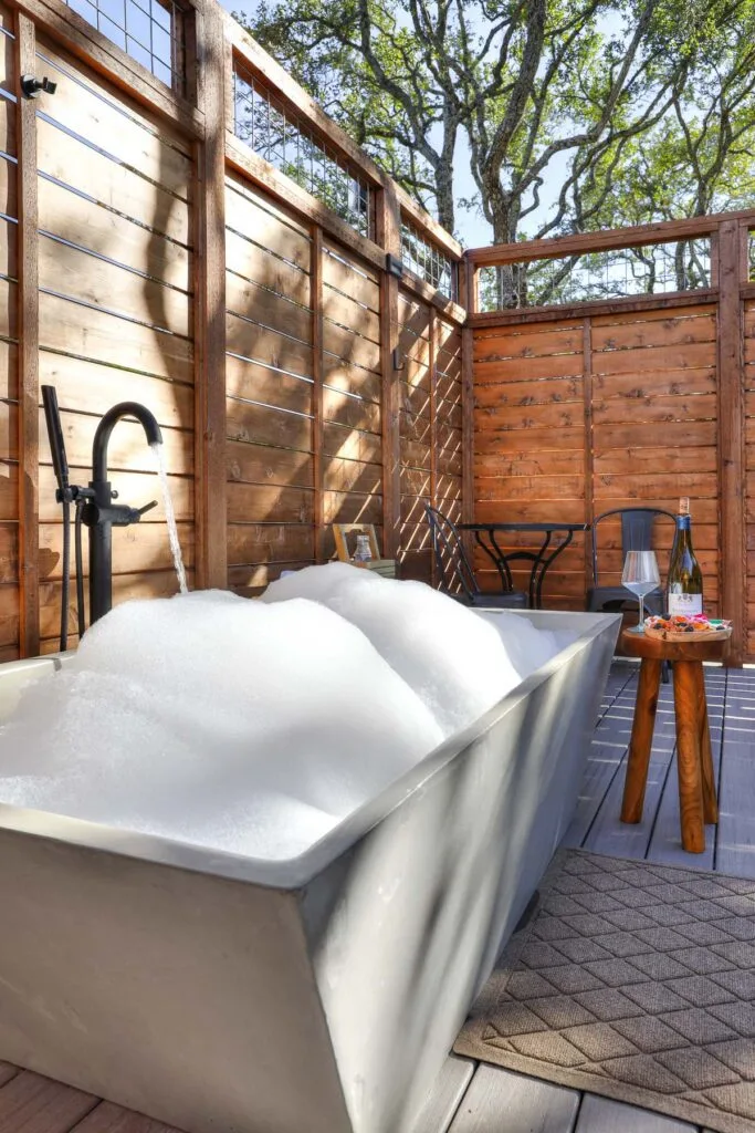 Outdoor soaking tub for two at Spoon Mountain Glamping, Wimberley TX